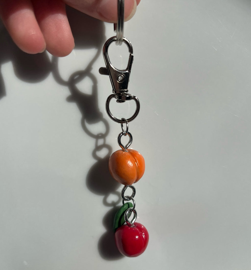 Porte-clés pêche et pomme